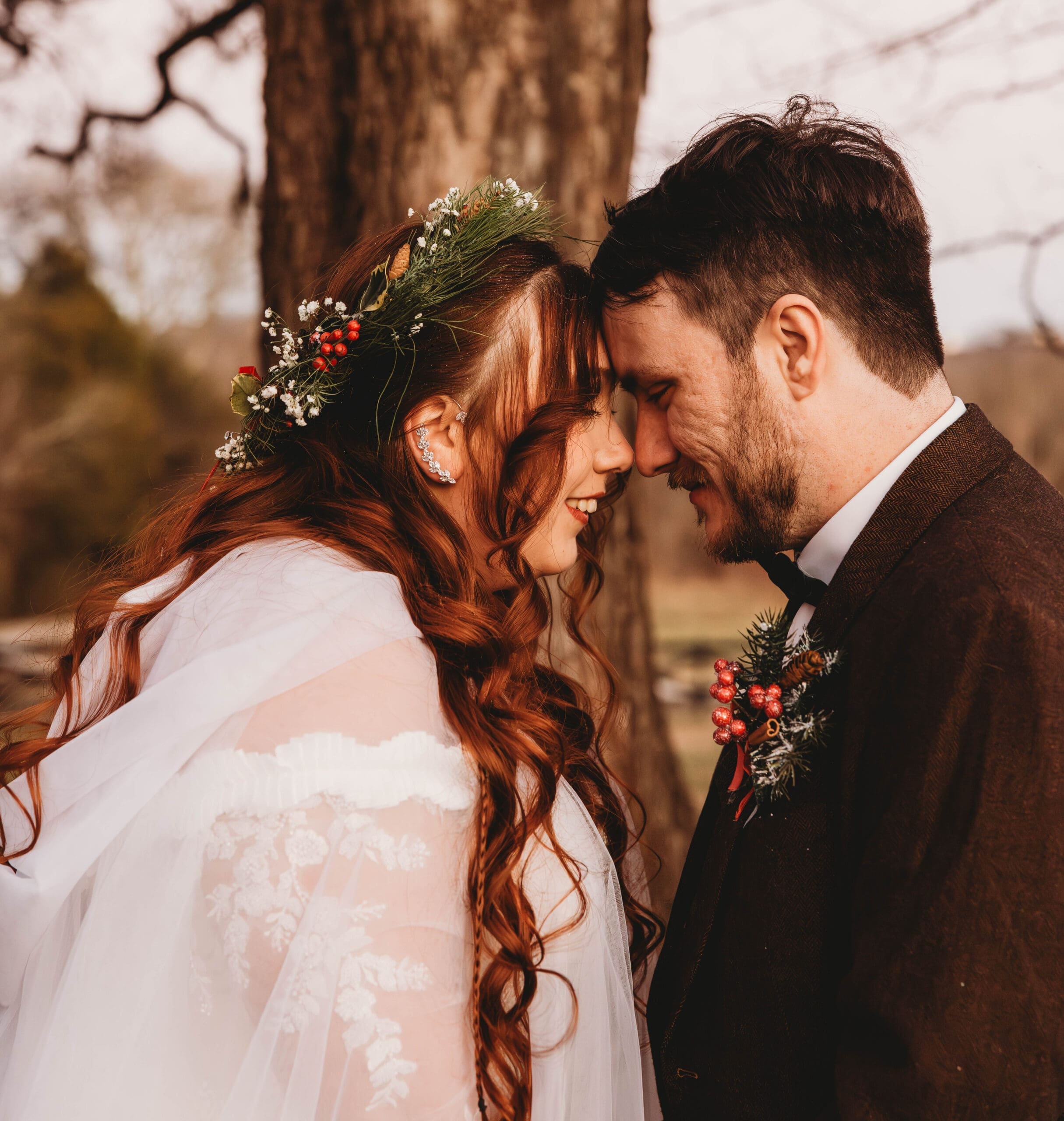 Bride and Groom with their foreheads touching at the Gray Dove on their wedding day in Ooltewah TN
